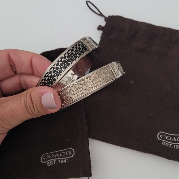 Set of Coach Bangles with protective bags.
